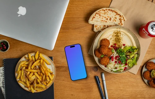 Bowl of hummus next to the Smartphone mockup