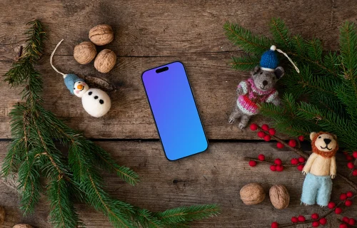 Christmas mockup with a smartphone and decorations