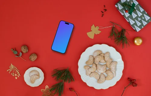 Teléfono de Navidad mockup sobre fondo rojo