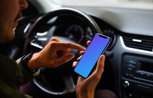 Driver using iPhone 11 mockup with both hands