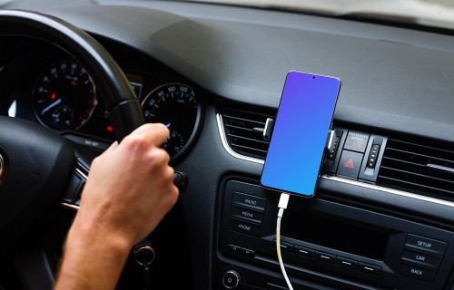 Driver using Samsung S20 mockup mounted while driving