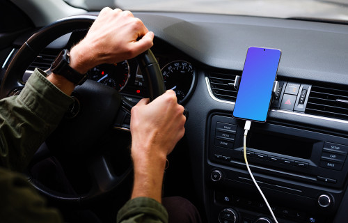 Driving a car with Samsung S20 mockup mounted for navigation