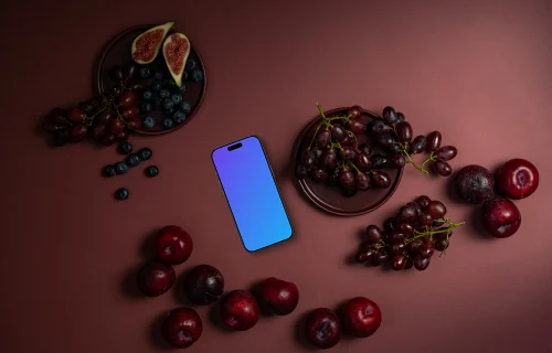 Aliments dans la teinte Viva Magenta et un iPhone