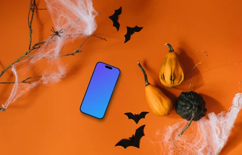 Fondo de Halloween mockup con un smartphone y murciélagos