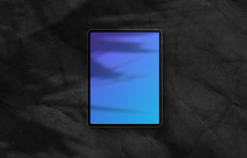 iPad Pro mockup on dark background (Portrait - Shadow 2)