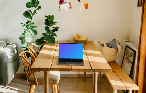 Laptop mockup on a table