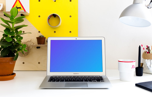 MacBook Air mockup at bright office