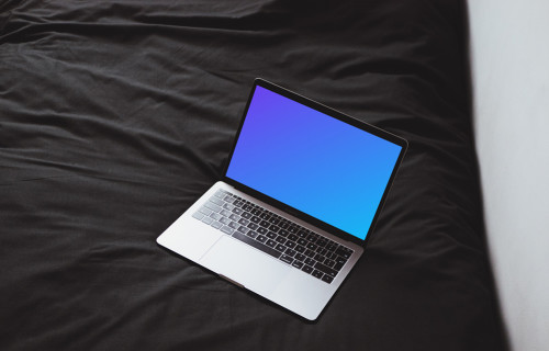 Macbook Pro mockup in dark bedroom