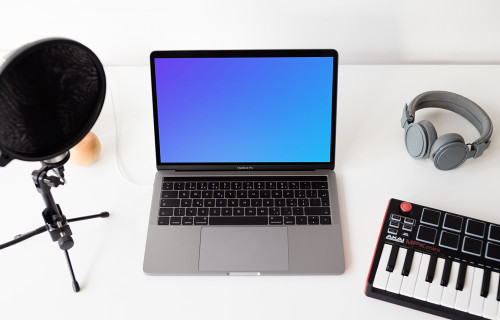 Macbook Pro mockup with touchbar and music equipment