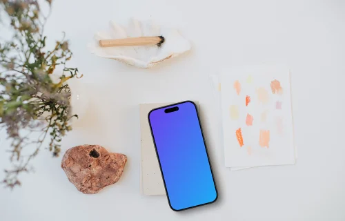 Mindful art scene including an iPhone mockup