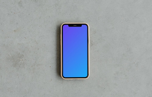 Minimal iPhone 12 mockup on grey surface