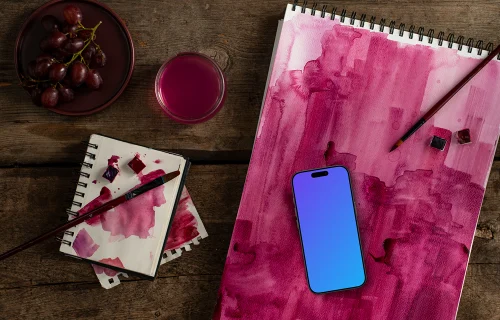 Téléphone mockup sur l'aquarelle Magenta