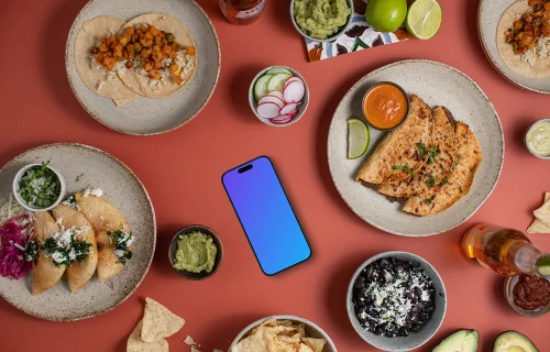 Phone mockup surrounded by Mexican food