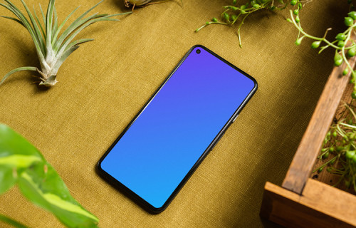 Pixel 5 mockup em uma mesa ao lado de um vaso de flores