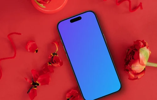 Smartphone mockup in a red scene with flowers