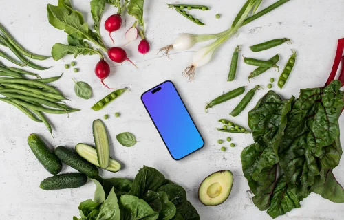 Smartphone mockup au milieu des légumes