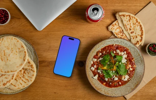 Smartphone mockup next to the Muhammara