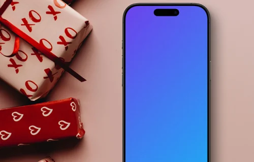 Smartphone mockup junto a regalos románticos envueltos