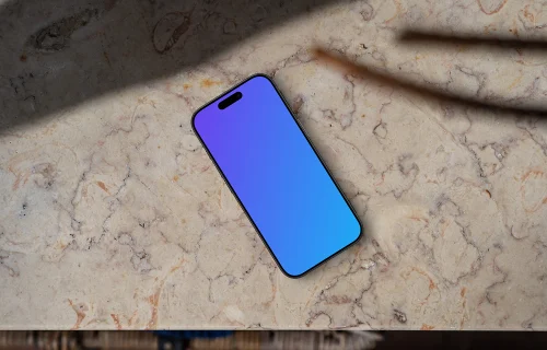 Smartphone mockup on a marble table