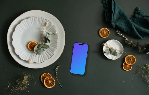 Smartphone mockup placed on the christmas table