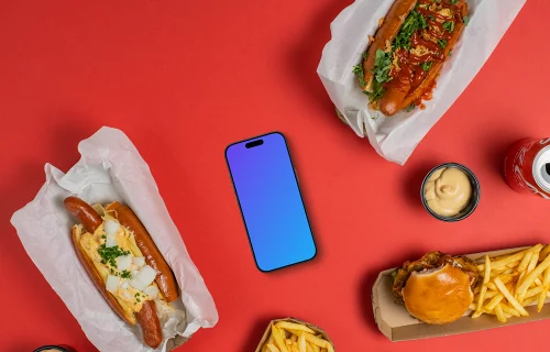 Smartphone mockup surrounded by hot-dogs