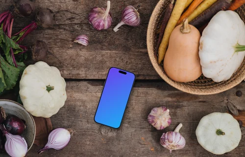 Smartphone mockup surrounded by vegetables