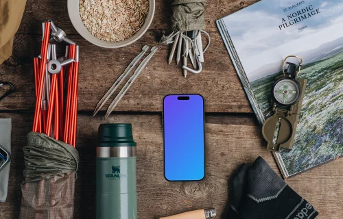 Smartphone mockup with camping supplies