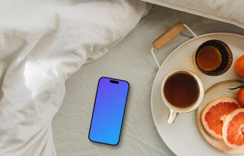 Scène de petit-déjeuner ensoleillé avec un iPhone mockup