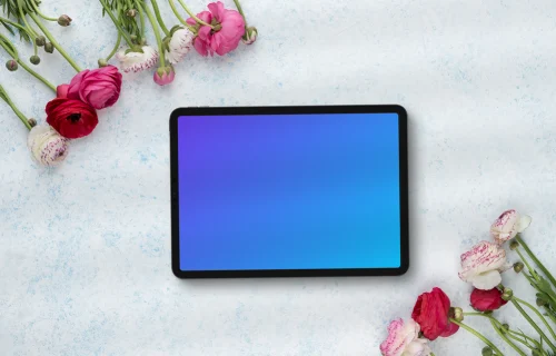 Tablet mockup surrounded by flowers