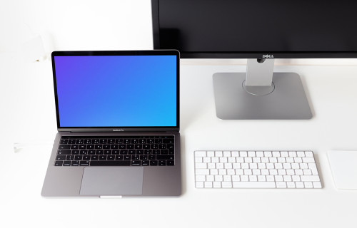 Top view mockup of the Macbook Pro on the white table