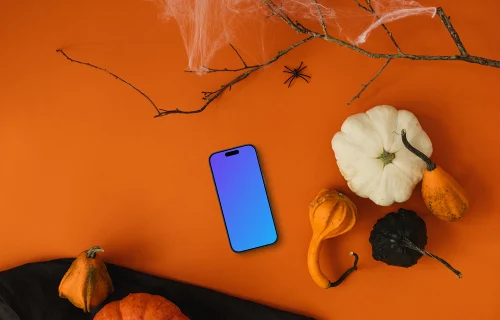 Vue de dessus d'un fond d'halloween mockup avec un téléphone