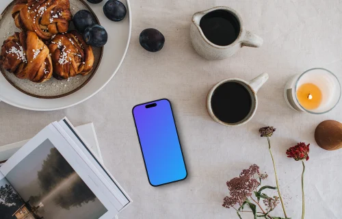Vue de dessus du téléphone mockup à côté du café