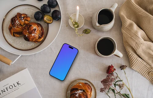 Vue de dessus du téléphone mockup sur la table à manger