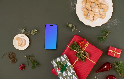 Top view of phone mockup with christmas decoration