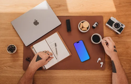 Top view of smartphone mockup at home office setup