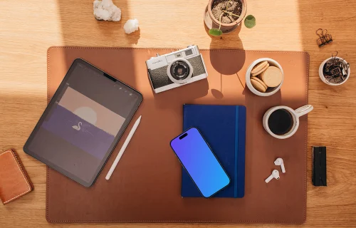 Top view of smartphone mockup on the office desk