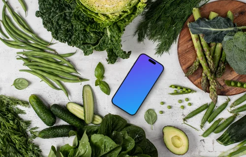 Les légumes autour du smartphone mockup 