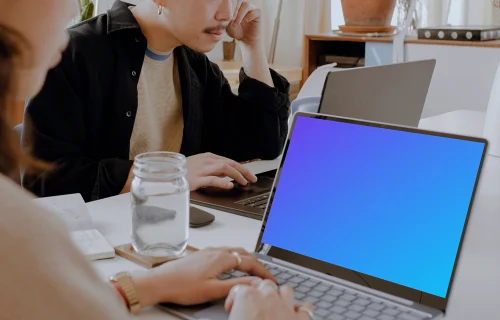 Woman working with Laptop Mockup