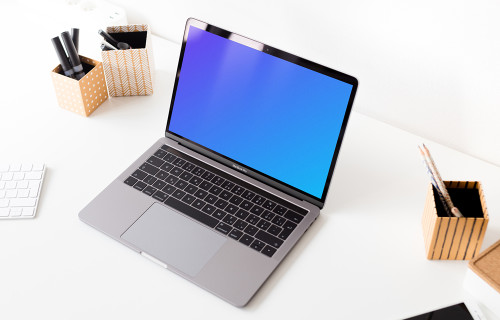 Angle view of the Macbook Pro mockup on the light table