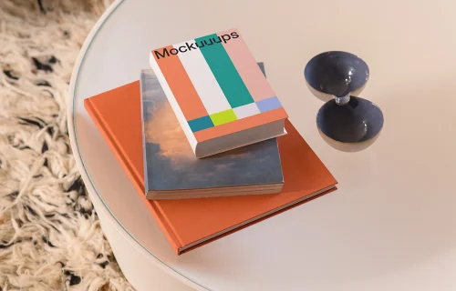 B-format book mockup on a glass table with decor