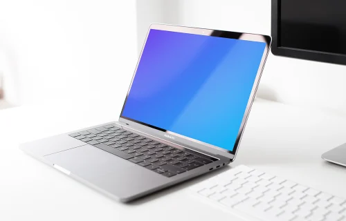 Bright view of the Macbook Pro mockup on the table