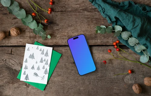Christmas mockup with a phone and greeting card