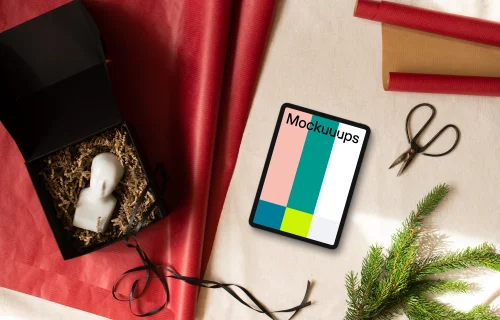 Christmas tablet mockup with gifts on the side