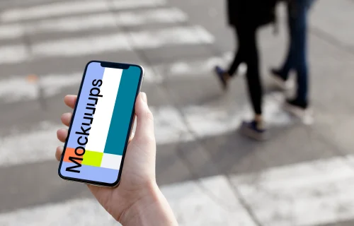 Crossing street with iPhone X mockup