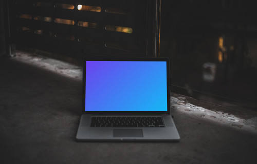 Dark mockup scene with Macbook Pro