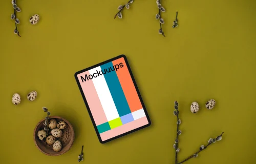 Easter Tablet mockup with furry catkins and quail eggs