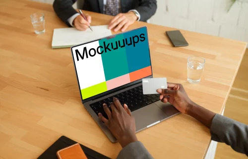 Female entrepreneur typing on a MacBook Pro mockup