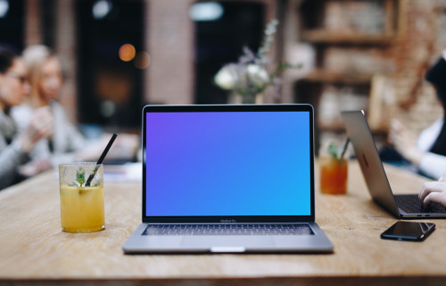 Front view mockup of Macbook Pro in the coffee