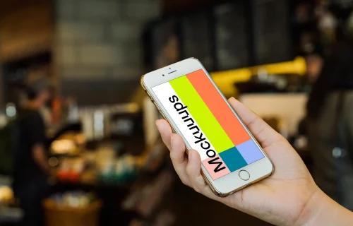 Holding iPhone 6 Gold mockup