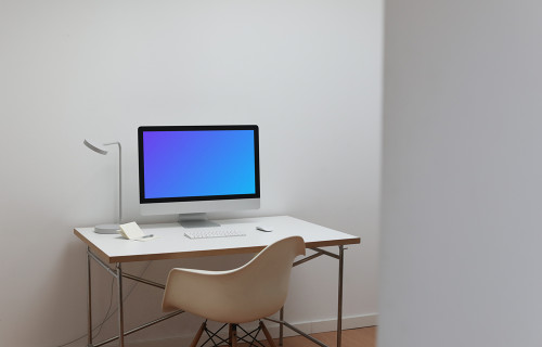 iMac mockup in a simple workspace